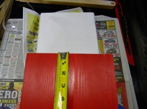 Measure vertical placement of birdhouse predator guard