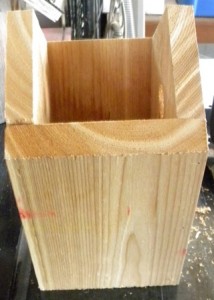 Wooden birdhouse side